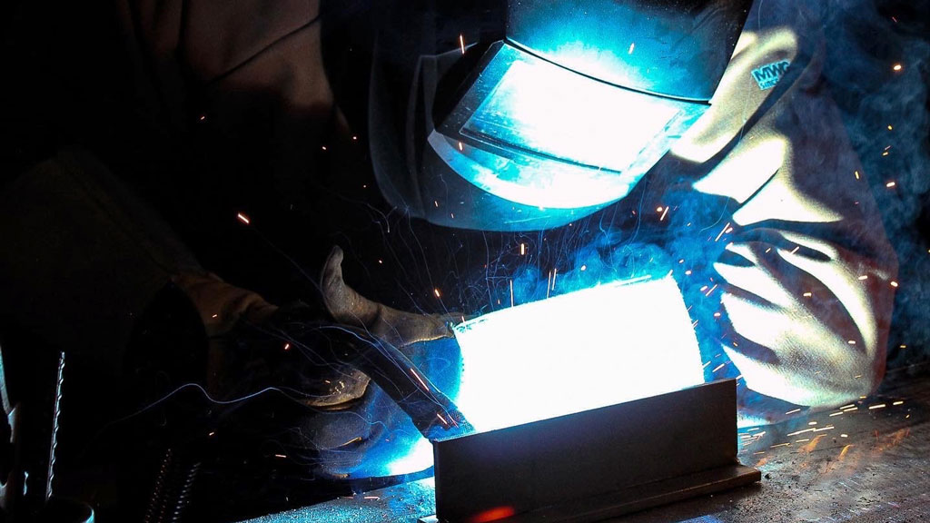Woman of Steel participant welding a T joint in the horizontal position using the Shielded Metal Arc welding process.